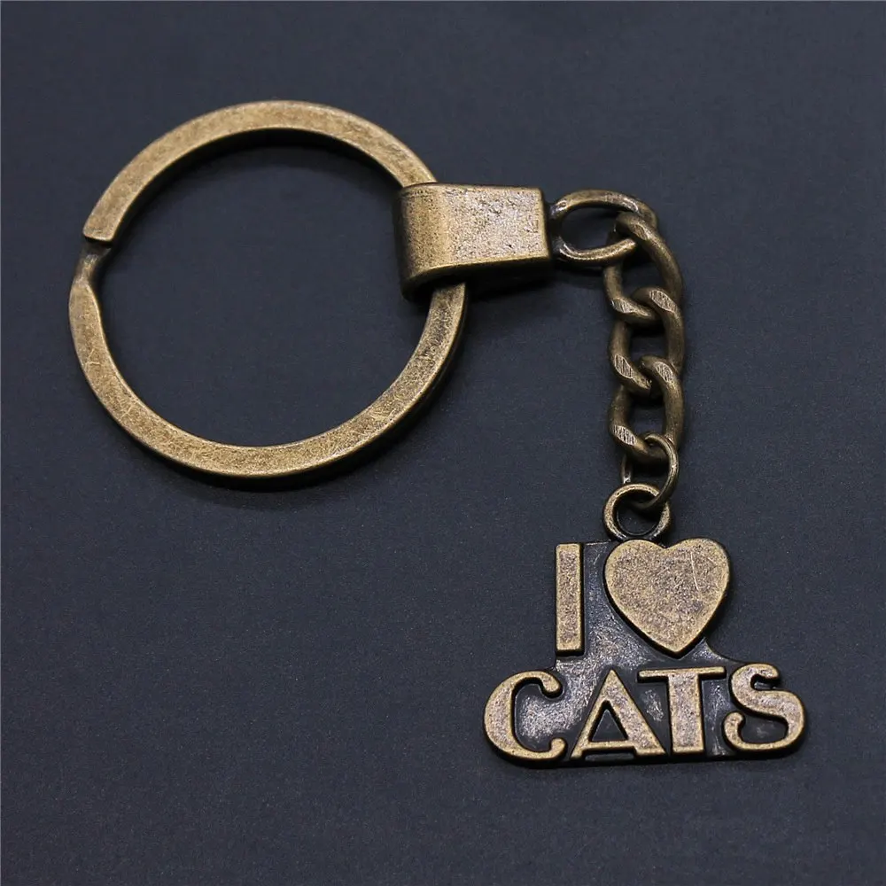 1 Kom. privjesak za ključeve Mačka je životinja privjesak za ključeve moda topla rasprodaja privjesak za žene privjesak za ključeve za auto privjesak za ključeve za automobil Slika 1 